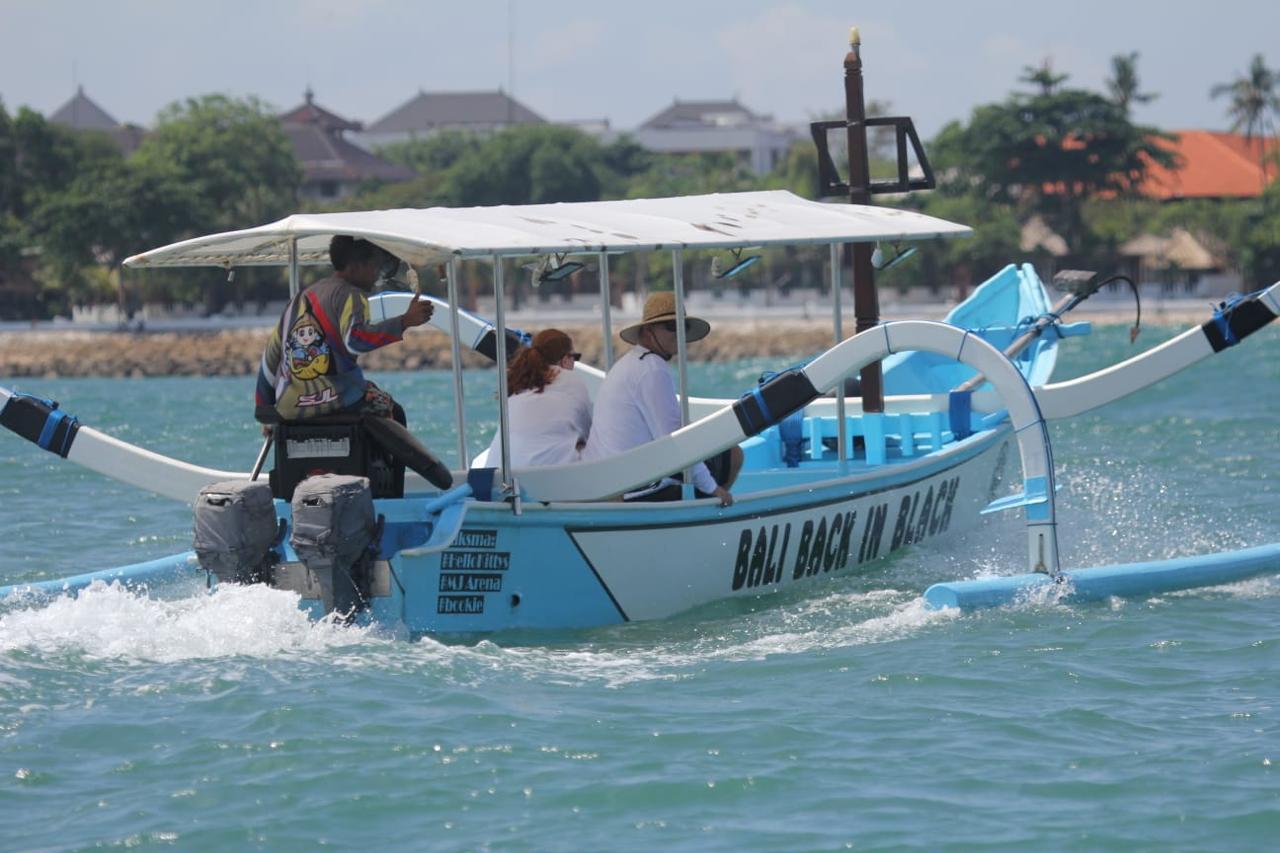 The Bali Back In Black boat on the open ocean